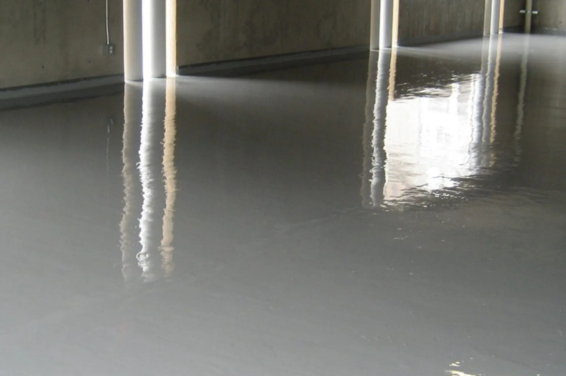 Tomtar-Roofing-and-Sheet-Metal-Waterproofing-Conservatory-Parkade-1 Flooded basement of building